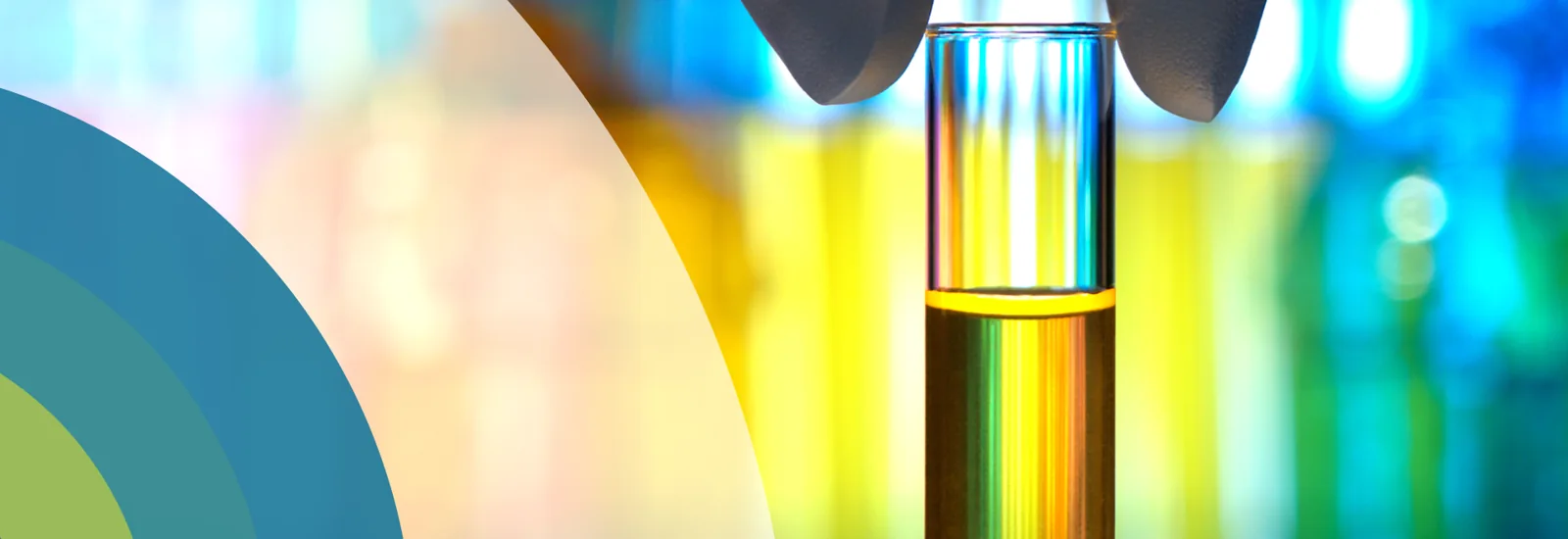 Test tube containing a yellow liquid sample, from the original HMC website